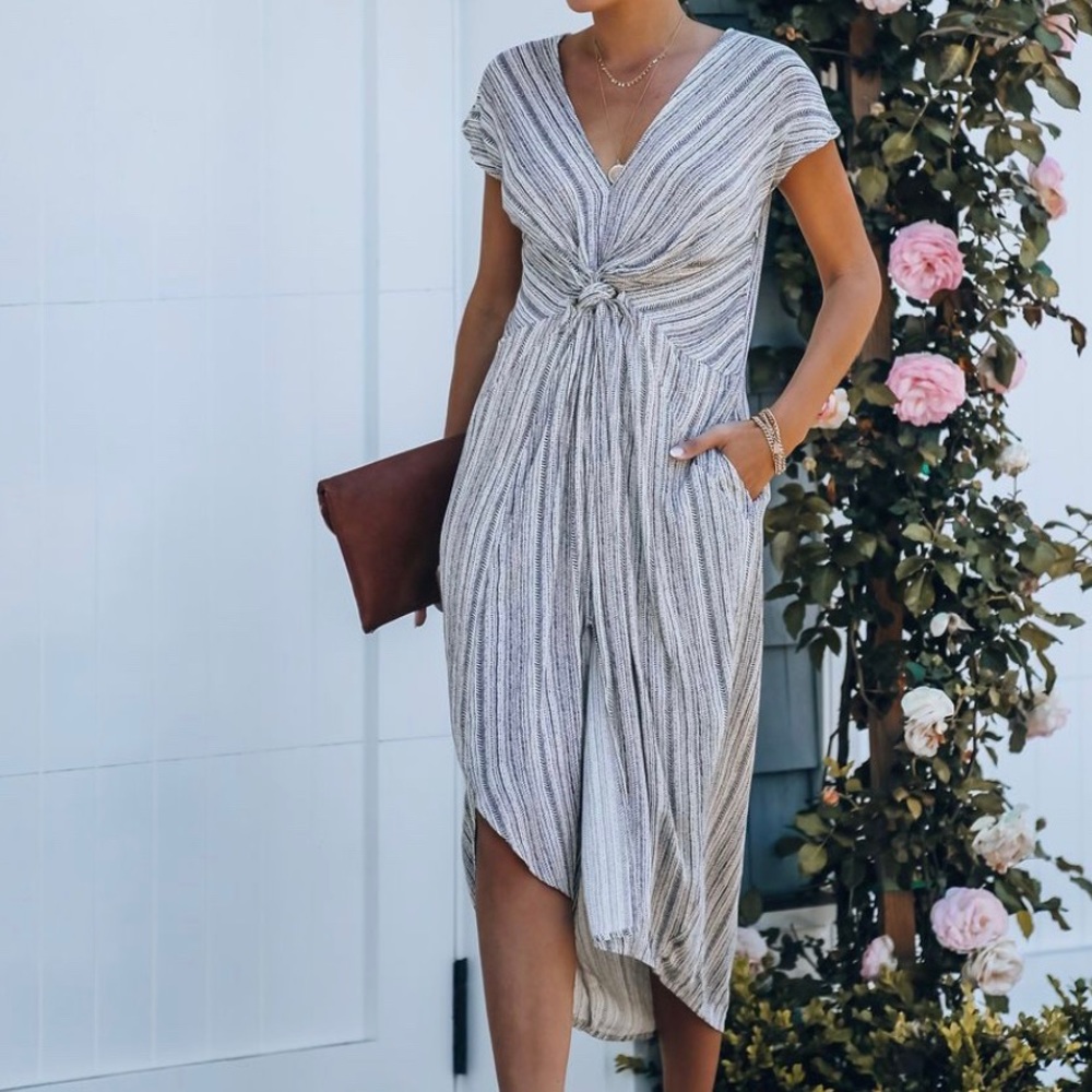 Nothing In This World Pocketed Twist Midi Dress